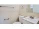 Clean bathroom with white vanity, toilet, and shower at 5405 Mariner Blvd, Spring Hill, FL 34609