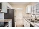 Modern kitchen featuring stainless steel appliances and granite countertops at 5405 Mariner Blvd, Spring Hill, FL 34609
