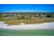 Aerial view of beach community, showing beach and homes at 524 Beach Rd # A, Sarasota, FL 34242