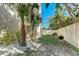 Small backyard with grassy area and grill at 524 Beach Rd # A, Sarasota, FL 34242