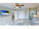 Main bedroom with king-size bed and ensuite bathroom at 524 Beach Rd # A, Sarasota, FL 34242