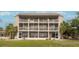 Front view of building with multiple units and balconies at 524 Beach Rd # A, Sarasota, FL 34242