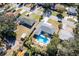 Aerial view showcasing home, pool, and neighborhood at 1344 Springdale St, Clearwater, FL 33755