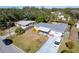 Aerial view of a charming house with a spacious yard and a pool at 1344 Springdale St, Clearwater, FL 33755