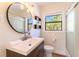 Bathroom with a vanity, toilet, and shower at 1344 Springdale St, Clearwater, FL 33755