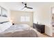 Bright bedroom with a king-size bed and dresser at 1344 Springdale St, Clearwater, FL 33755