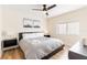 King-size bedroom with ceiling fan, neutral decor, and ample closet space at 1344 Springdale St, Clearwater, FL 33755