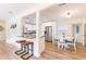 Modern kitchen with white cabinets, granite countertops, and breakfast bar at 1344 Springdale St, Clearwater, FL 33755