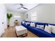 Living room with blue sofa and coffee table at 1344 Springdale St, Clearwater, FL 33755