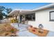 Inviting front porch with wooden posts and comfortable seating at 1344 Springdale St, Clearwater, FL 33755