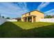 Spacious backyard with screened patio at 20102 Blue Daze Ave, Tampa, FL 33647