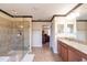 Spa-like bathroom with a walk-in shower and a soaking tub at 20102 Blue Daze Ave, Tampa, FL 33647
