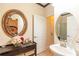 Clean bathroom with a sink, vanity, and a view of the shower at 20102 Blue Daze Ave, Tampa, FL 33647