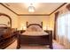 Bright bedroom featuring a king-size bed and ample natural light at 20102 Blue Daze Ave, Tampa, FL 33647