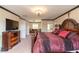 Spacious Primary bedroom with sitting area and ensuite bathroom at 20102 Blue Daze Ave, Tampa, FL 33647