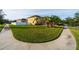 House with nicely landscaped front yard at 20102 Blue Daze Ave, Tampa, FL 33647