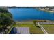 Elevated view of backyard with deck and lake access at 17228 Blooming Fields Dr, Land O Lakes, FL 34638