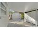 Covered patio with white vinyl fence and tile flooring at 4260 Des Plaines Dr, Sarasota, FL 34233