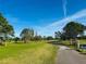 Picturesque golf course with tree-lined fairways at 9743 36Th N Way # 4, Pinellas Park, FL 33782