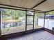 Relaxing screened patio overlooking a pond at 1713 Castle Rock Rd, Tampa, FL 33612