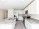 Modern kitchen with granite countertops and stainless steel appliances at 22162 Seaton Ave, Port Charlotte, FL 33954