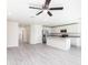 Spacious living room with ceiling fan and hardwood floors at 22162 Seaton Ave, Port Charlotte, FL 33954