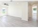 Bright living room with hardwood floors and ceiling fan at 22162 Seaton Ave, Port Charlotte, FL 33954