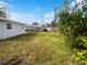Large backyard with grassy area, shed, and privacy fence at 11397 86Th Ave, Seminole, FL 33772