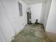 Unfinished basement area with water heater and plumbing at 11397 86Th Ave, Seminole, FL 33772