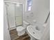 Clean bathroom with updated vanity, shower, and toilet at 11397 86Th Ave, Seminole, FL 33772