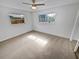 Bright and airy bedroom with plush carpet and lots of natural light at 11397 86Th Ave, Seminole, FL 33772