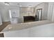 Modern kitchen features updated cabinets, quartz countertops, and stainless steel appliances at 11397 86Th Ave, Seminole, FL 33772
