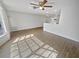 Spacious living room with hardwood floors and lots of natural light at 11397 86Th Ave, Seminole, FL 33772