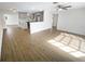 Open living space with hardwood floors and kitchen views at 11397 86Th Ave, Seminole, FL 33772