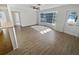 Spacious living area with hardwood floors and large windows at 11397 86Th Ave, Seminole, FL 33772