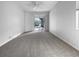 Spacious bedroom with carpet flooring and pool view at 7431 39Th E Ct, Sarasota, FL 34243