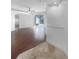 Large living room with hardwood floors and sliding glass doors at 7431 39Th E Ct, Sarasota, FL 34243