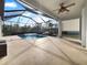 Relaxing screened-in pool and spa area with a covered patio at 7431 39Th E Ct, Sarasota, FL 34243