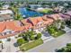 Aerial view of villas with private garages and waterfront access at 818 Via Tripoli, Punta Gorda, FL 33950