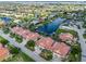 Aerial view of waterfront property, showcasing homes and a canal at 818 Via Tripoli, Punta Gorda, FL 33950