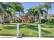 Backyard oasis with lush landscaping and canal view at 818 Via Tripoli, Punta Gorda, FL 33950