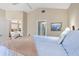 Spacious bedroom with plush bedding and access to other rooms at 818 Via Tripoli, Punta Gorda, FL 33950