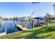 Private boat dock on a calm canal waterway at 818 Via Tripoli, Punta Gorda, FL 33950