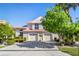 Two-story house with double garage and lush landscaping at 818 Via Tripoli, Punta Gorda, FL 33950