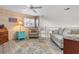 Cozy loft area featuring a comfortable seating arrangement and built-in shelving at 818 Via Tripoli, Punta Gorda, FL 33950