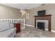 Loft with electric fireplace and seating area at 818 Via Tripoli, Punta Gorda, FL 33950
