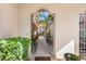 Pathway to private courtyard with gate at 818 Via Tripoli, Punta Gorda, FL 33950