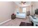 Spacious bedroom with large bed and home office at 320 Georgia Ave, Crystal Beach, FL 34681