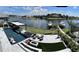 Stunning aerial view showcasing pool, spa, and waterfront access at 811 Manns Harbor Dr, Apollo Beach, FL 33572