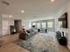 Spacious game room with pool table,arcade games, and comfortable seating at 811 Manns Harbor Dr, Apollo Beach, FL 33572